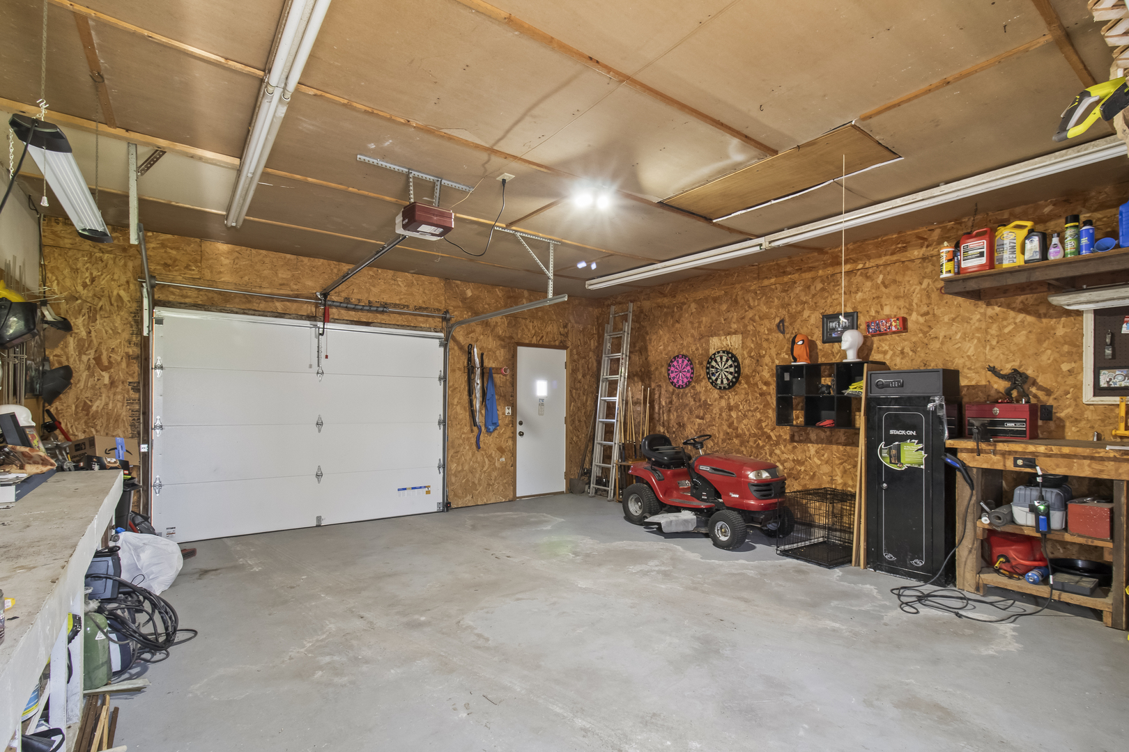 812 West 3rd Street Gilman, IL 60938 - Photo 18 of 19 a view of a garage with rack and bicycle