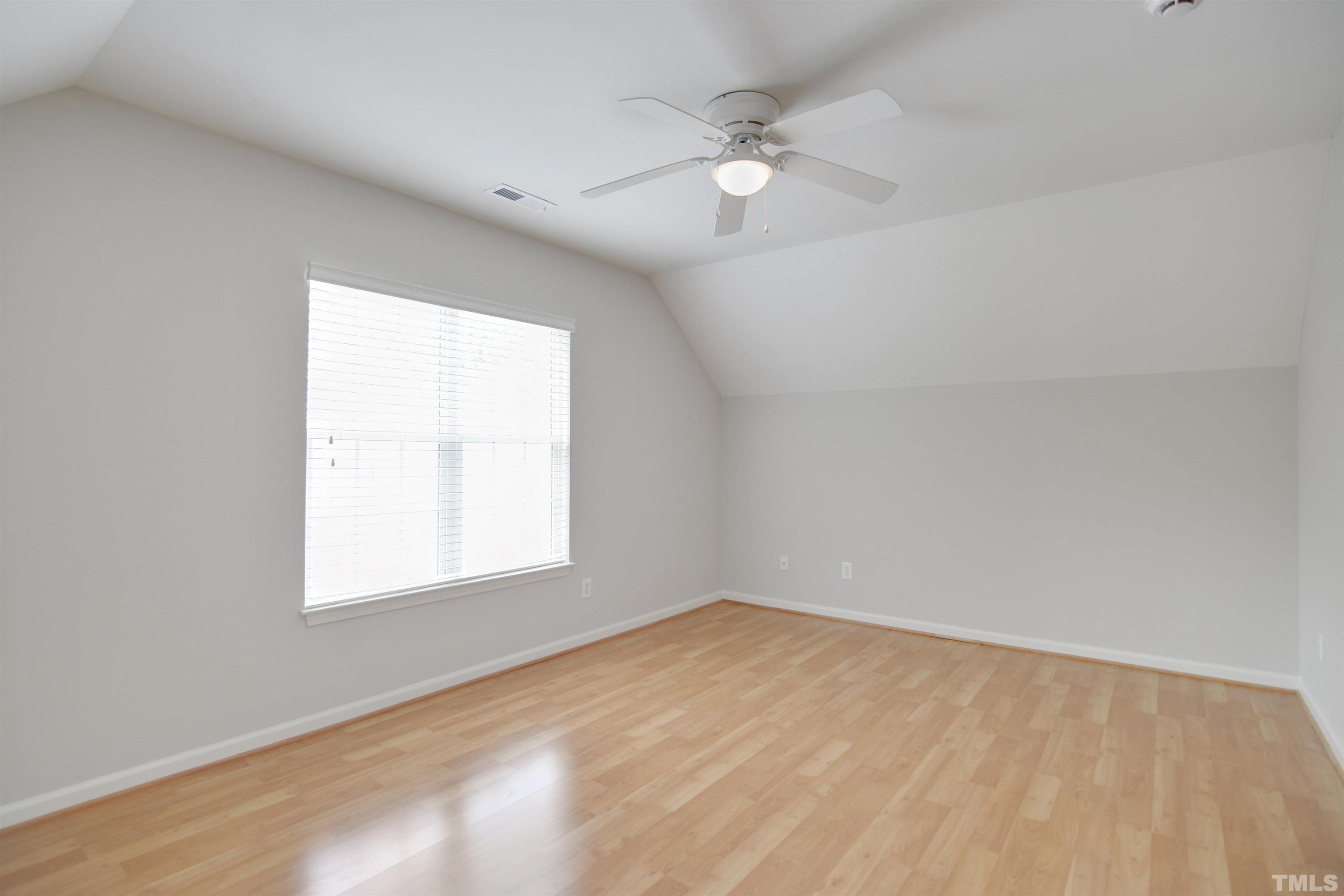 8400 Astwell Court Raleigh, NC 27615 - Photo 18 of 21 an empty room with a window