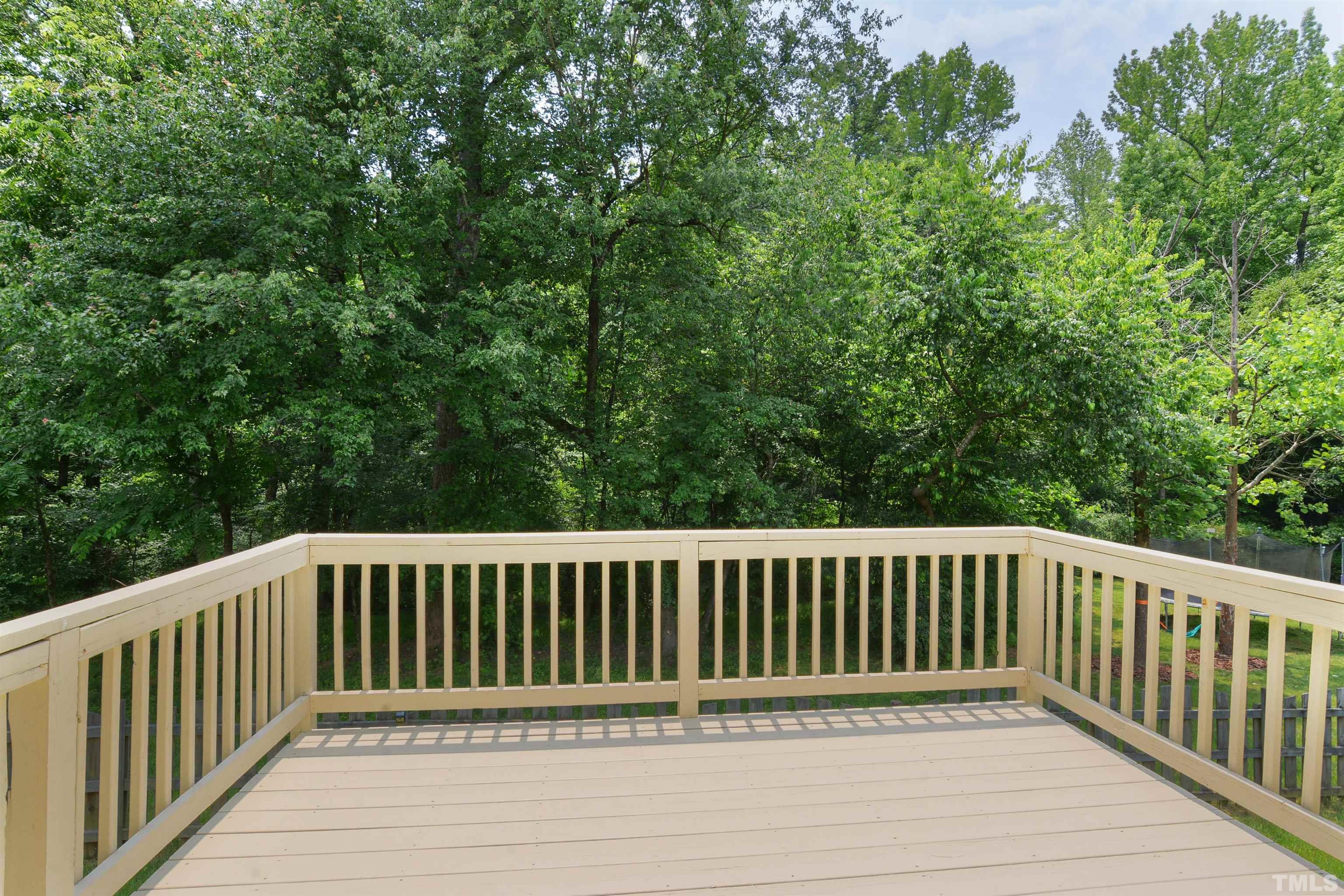 8400 Astwell Court Raleigh, NC 27615 - Photo 19 of 21 a view of deck and backyard