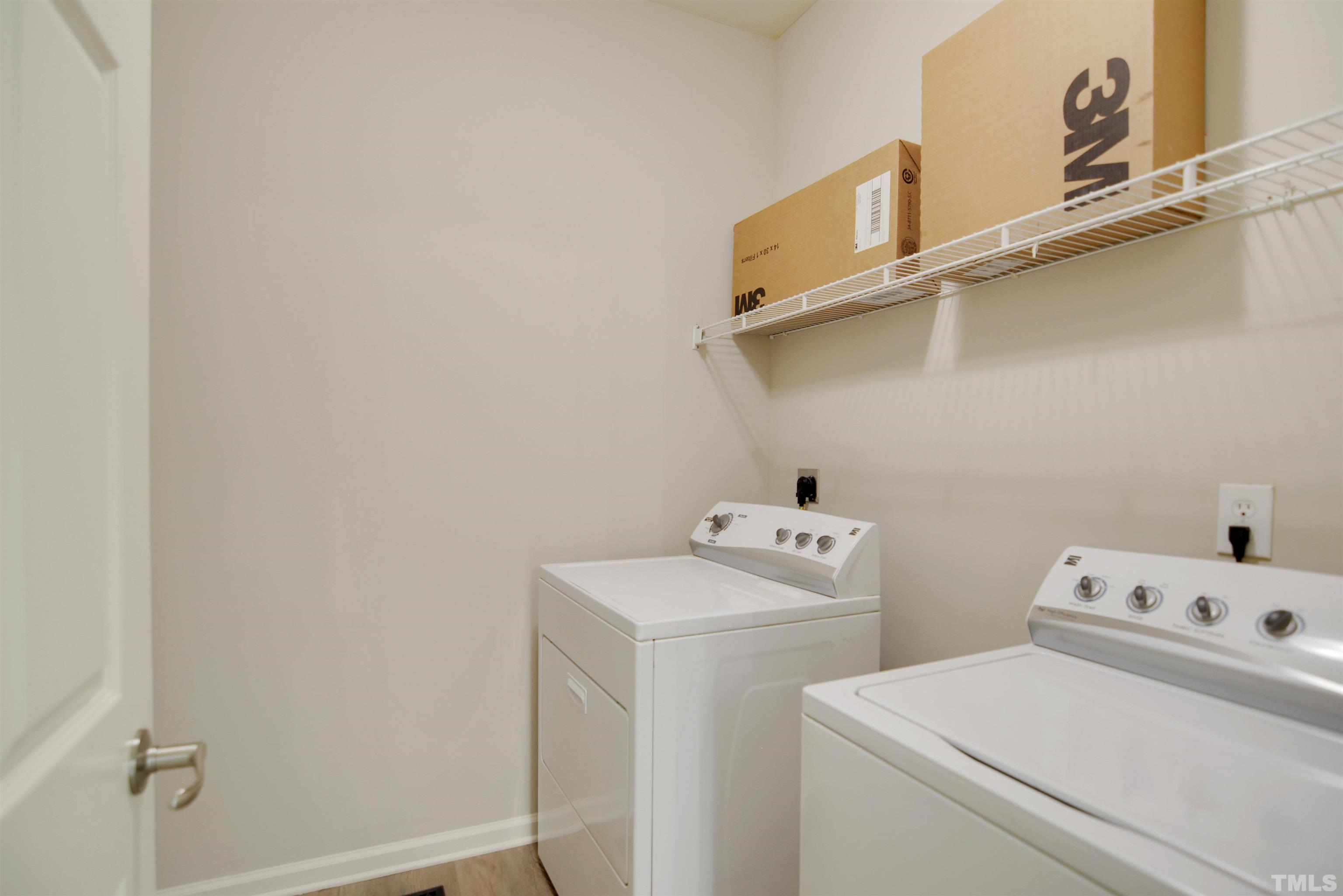 8400 Astwell Court Raleigh, NC 27615 - Photo 10 of 21 a utility room with dryer and washer