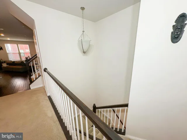 a view of a livingroom with furniture and a window