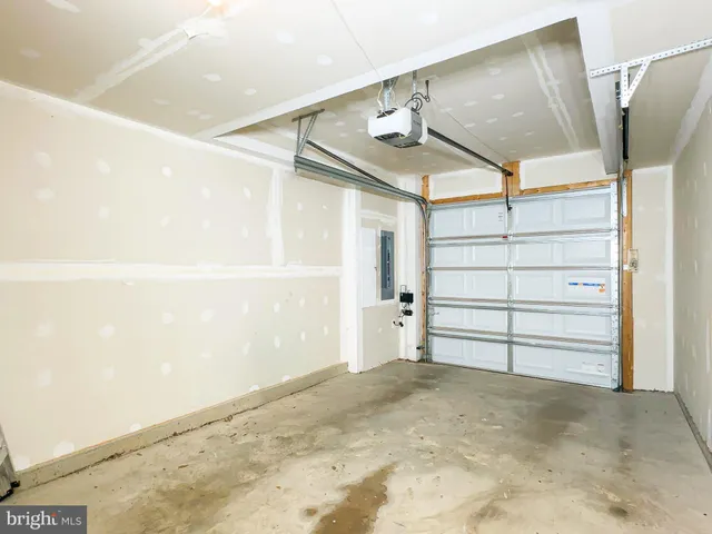 a view of a building with sitting area