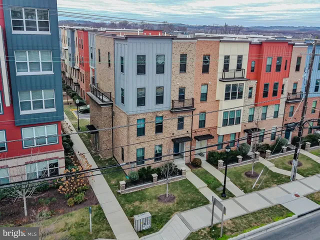 a view of a building with a yard