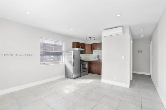 a view of a kitchen with a sink cabinets and a window