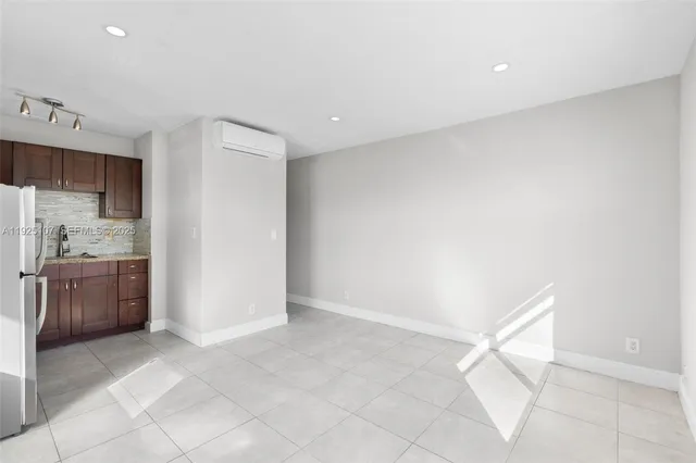 a view of a kitchen with a sink