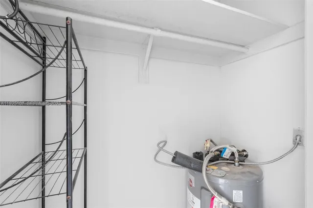 a bathroom with a light fixture and a sink