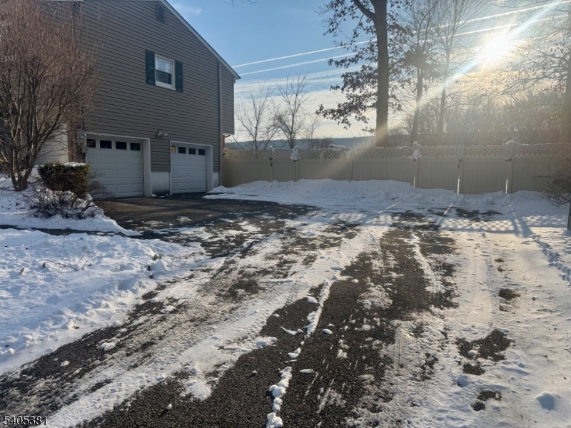 9 Windsor Drive Oak Ridge, NJ 07438 - Photo 12 of 50 a view of a yard with a tree