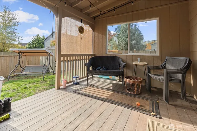 a view of a two chairs in the deck