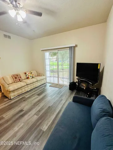 a bathroom with a sink toilet and a shower
