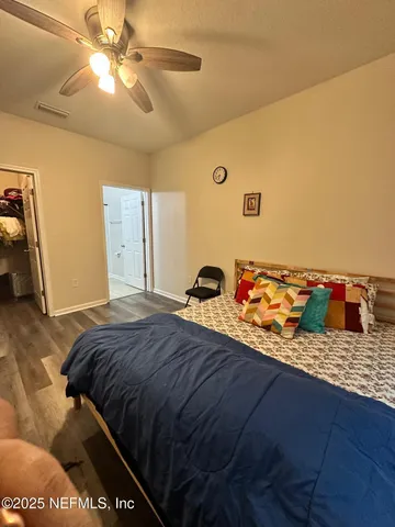 a kitchen with stainless steel appliances granite countertop a refrigerator and a stove