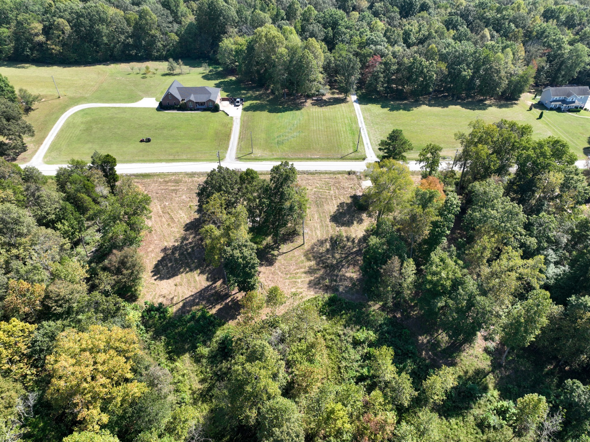 3 Shady Grove Road Clarksville, TN 37043 - Photo 4 of 7 a view of a lake with houses