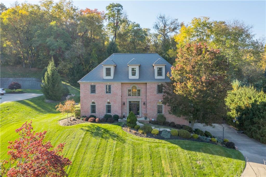 102 Lantern Circle McMurray, PA 15317 - Photo 1 of 25 a front view of a house with swimming pool