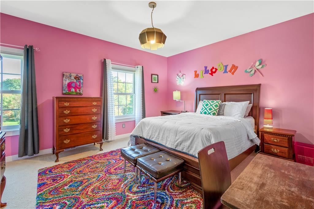 102 Lantern Circle McMurray, PA 15317 - Photo 12 of 25 a bedroom with a bed a dresser and a window