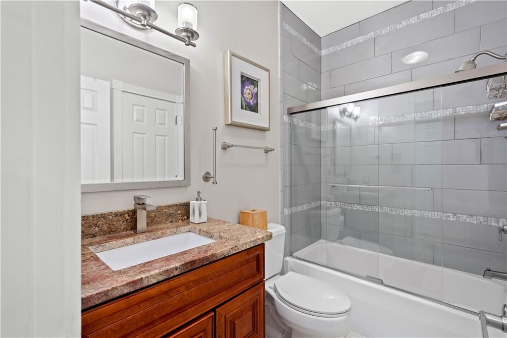 102 Lantern Circle McMurray, PA 15317 - Photo 13 of 25 a bathroom with a granite countertop sink toilet and shower