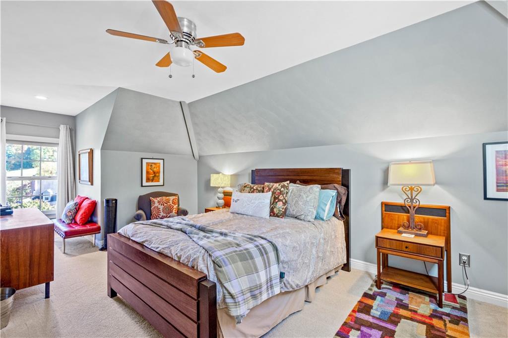 102 Lantern Circle McMurray, PA 15317 - Photo 18 of 25 a bedroom with a bed and a chandelier