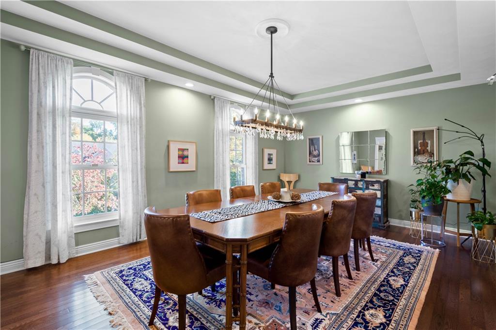 102 Lantern Circle McMurray, PA 15317 - Photo 3 of 25 a view of a dining room with furniture window and wooden floor