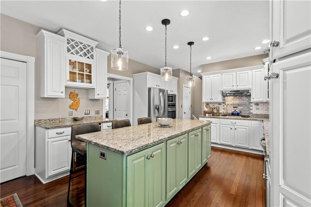 102 Lantern Circle McMurray, PA 15317 - Photo 5 of 25 a kitchen with a sink stove and refrigerator