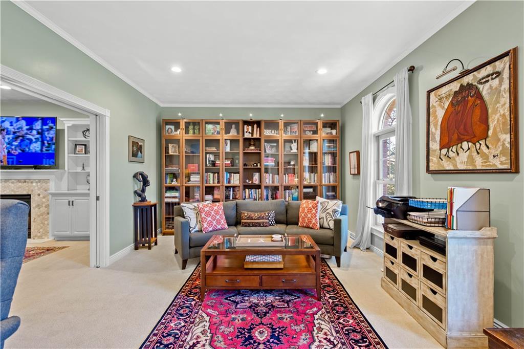 102 Lantern Circle McMurray, PA 15317 - Photo 9 of 25 a living room with furniture and a book shelf