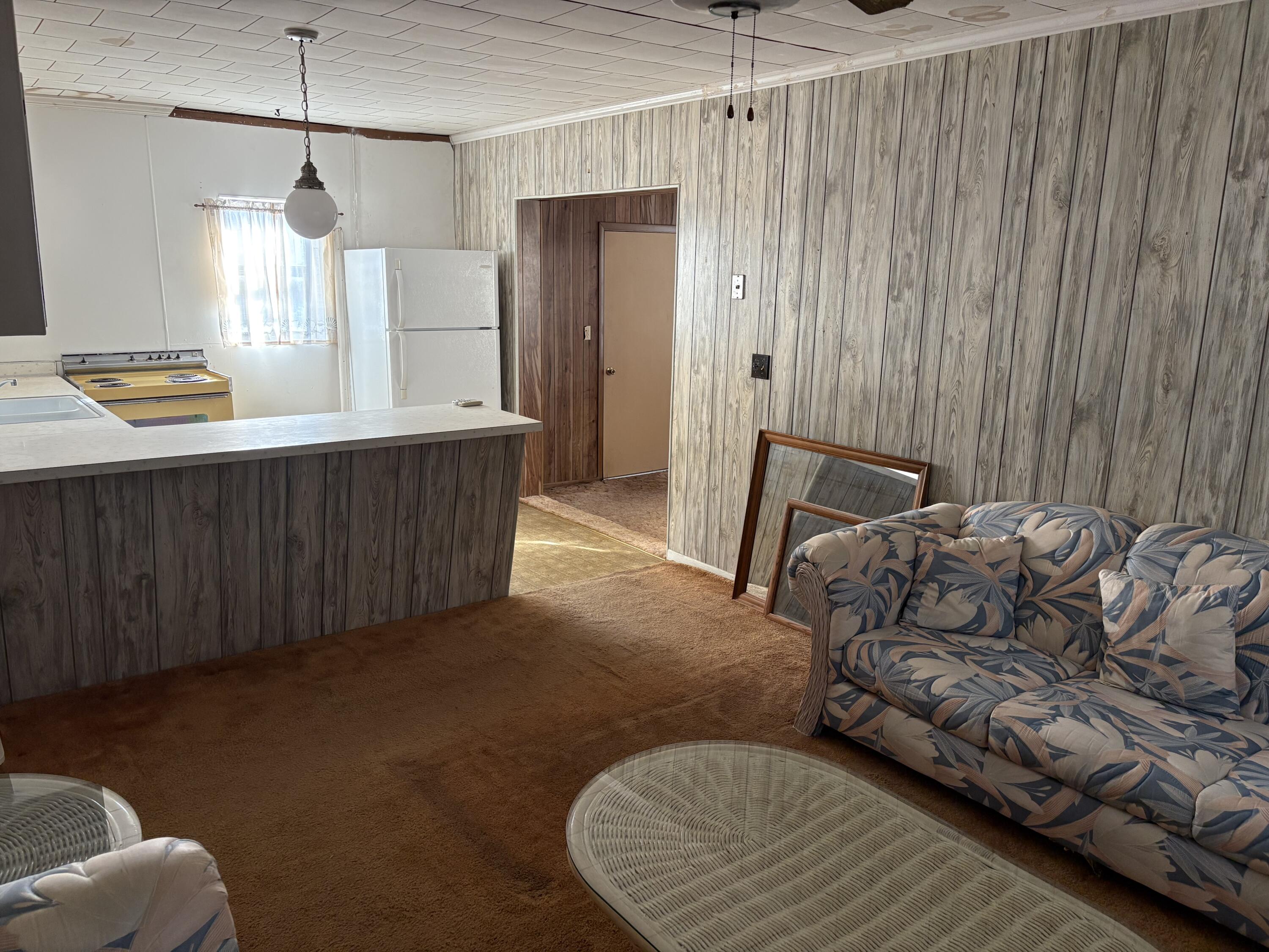 197 Cobb Road Panama City Beach, FL 32413 - Photo 14 of 18 a bedroom with a bed and a dresser