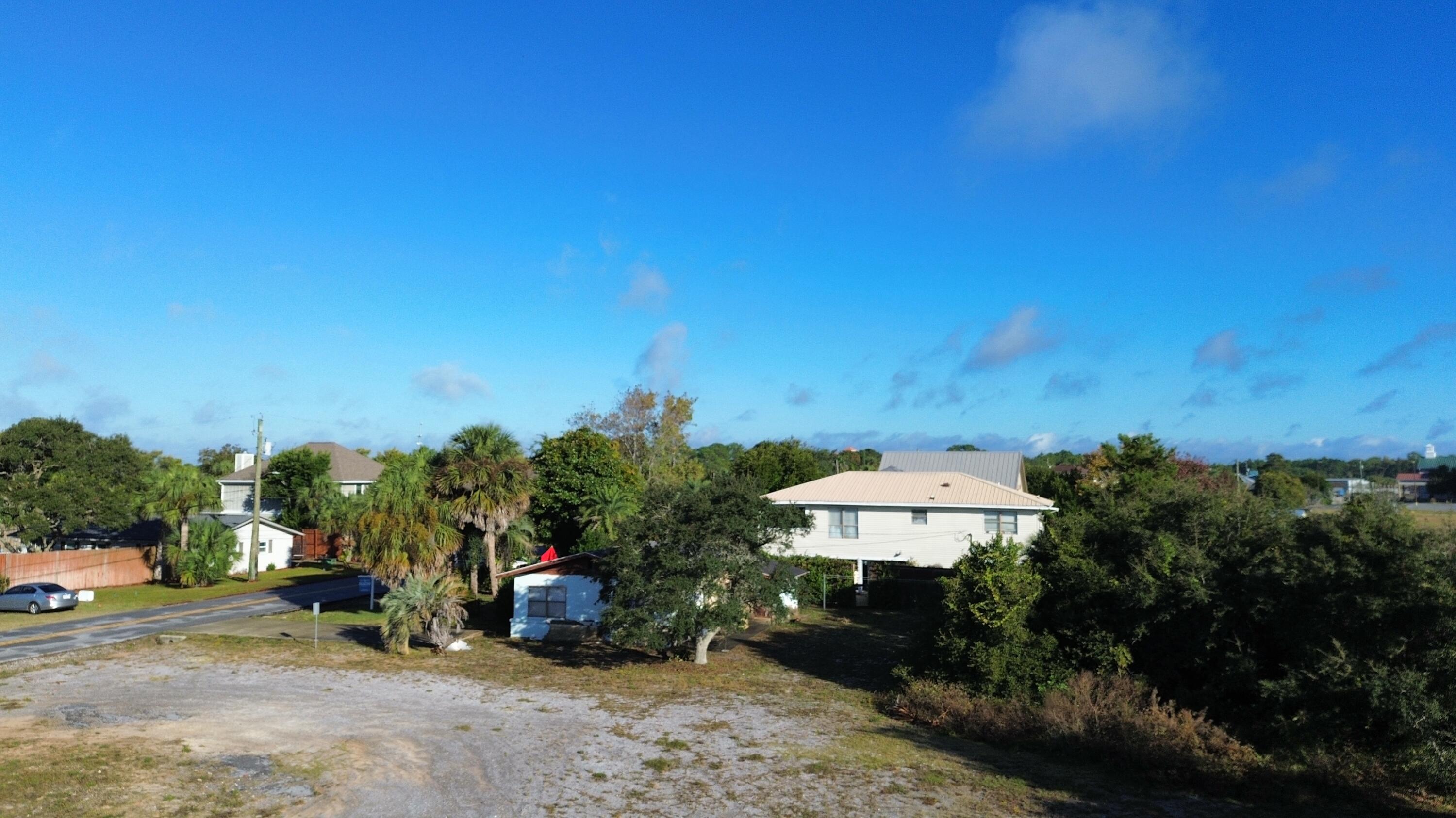 197 Cobb Road Panama City Beach, FL 32413 - Photo 7 of 18 a view of a park that has a bunch of plants and trees