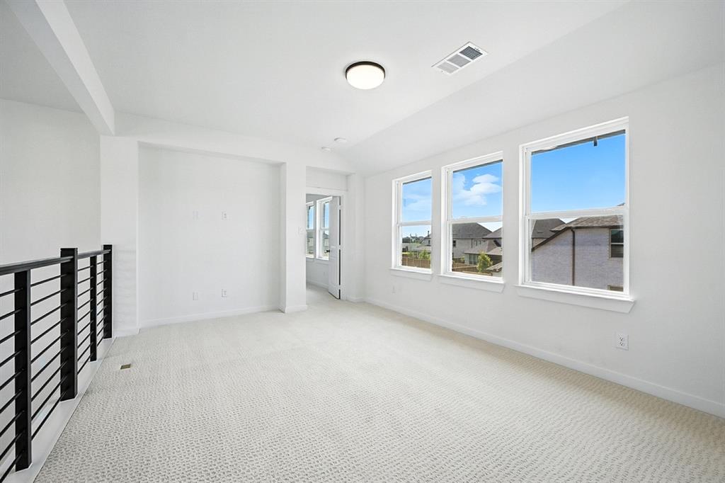 4520 Script Street Prosper, TX 75078 - Photo 23 of 27 a view of an empty room with a window