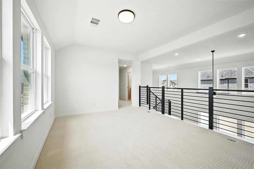 4520 Script Street Prosper, TX 75078 - Photo 24 of 27 a view of a livingroom with a large window
