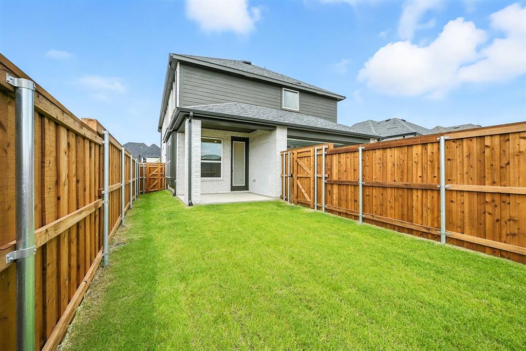 4520 Script Street Prosper, TX 75078 - Photo 25 of 27 a view of a porch with a backyard