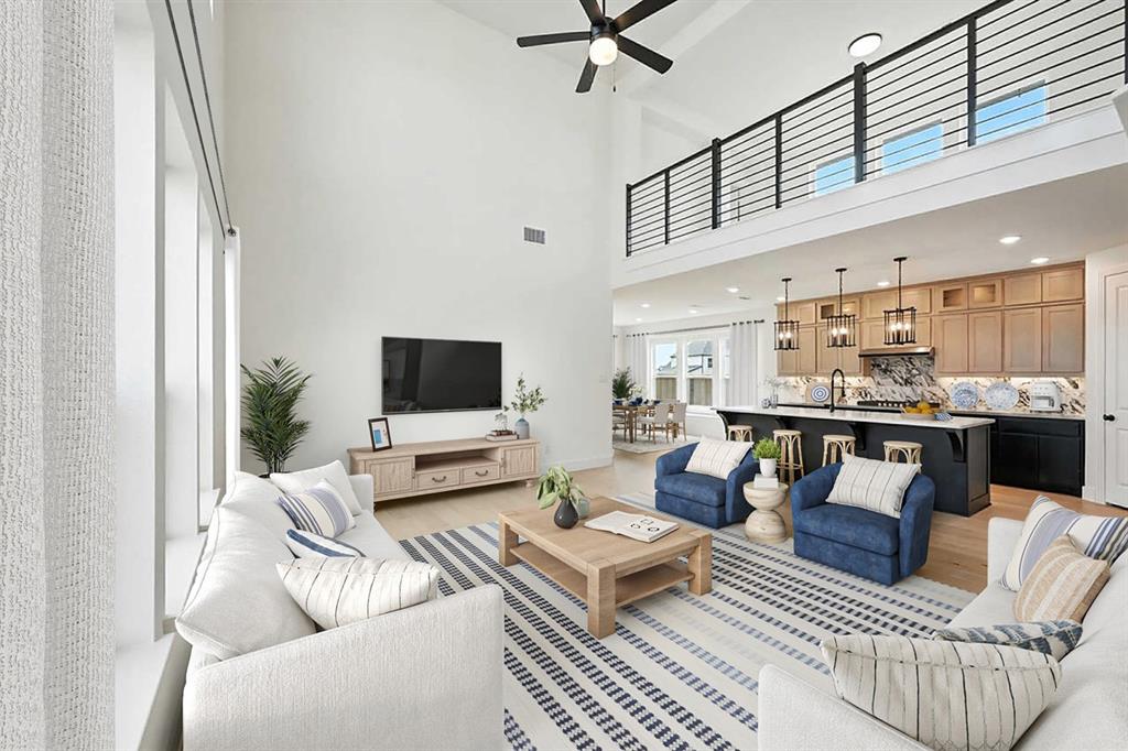 4520 Script Street Prosper, TX 75078 - Photo 3 of 27 a living room with furniture kitchen view and a window