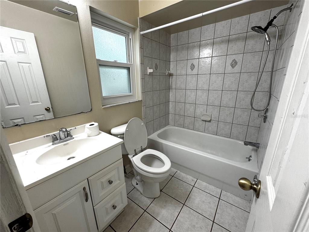 3419 Pearson Road Valrico, FL 33596 - Photo 11 of 20 a bathroom with a sink toilet and shower