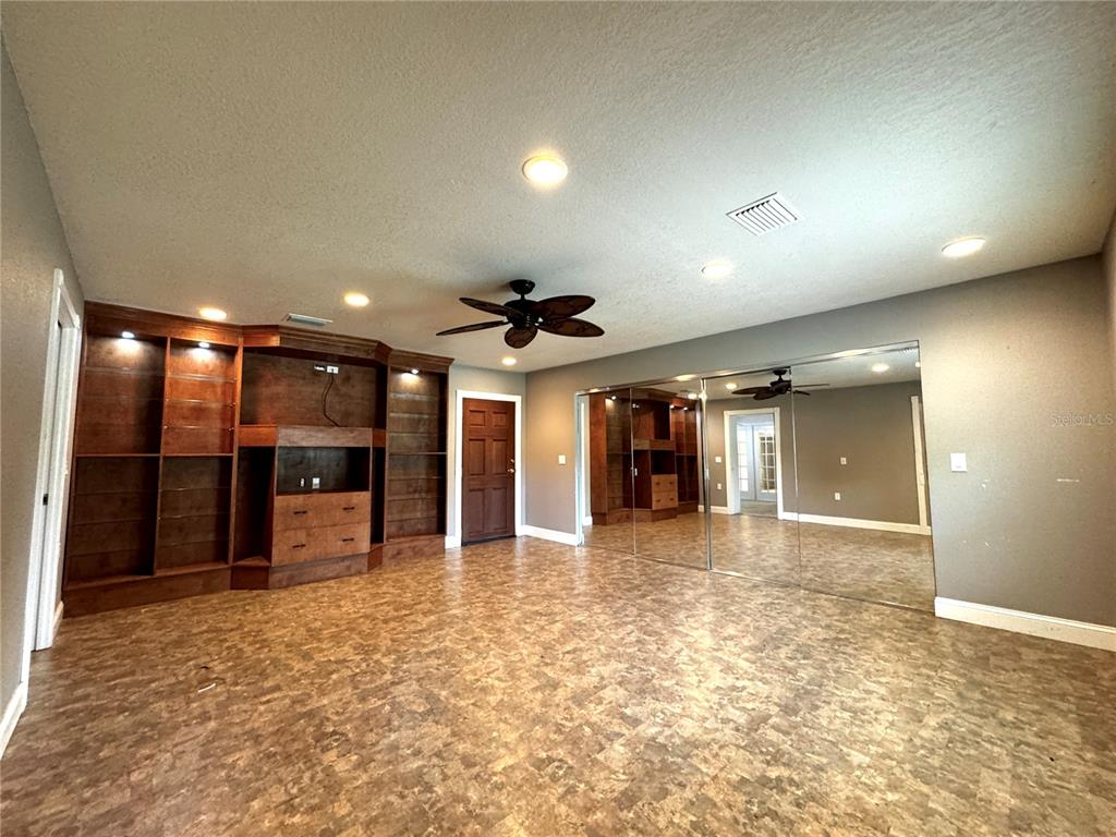 3419 Pearson Road Valrico, FL 33596 - Photo 15 of 20 an empty room with closet and windows