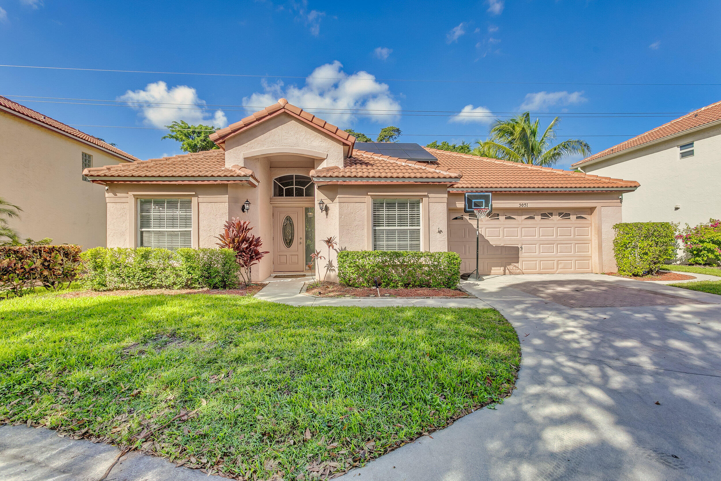 3051 Casa Rio Court Riviera Beach, FL 33418 - Photo 1 of 56 Front Exterior