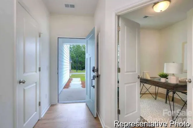 a workspace with furniture and a window