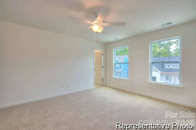 an empty room with a bathroom