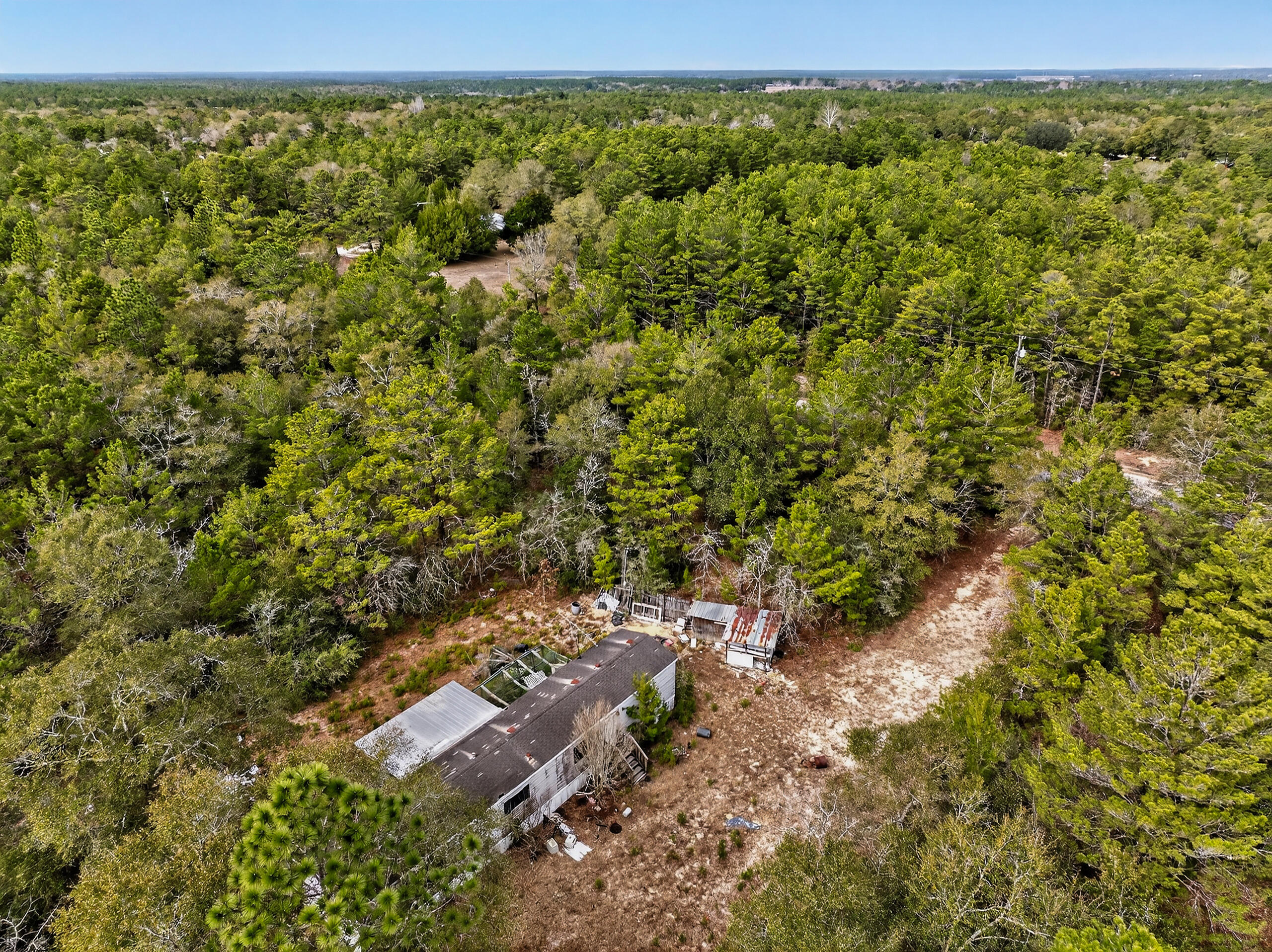 610 Spring Hill Road DeFuniak Springs, FL 32433 - Photo 11 of 20 an aerial view of residential house with outdoor space