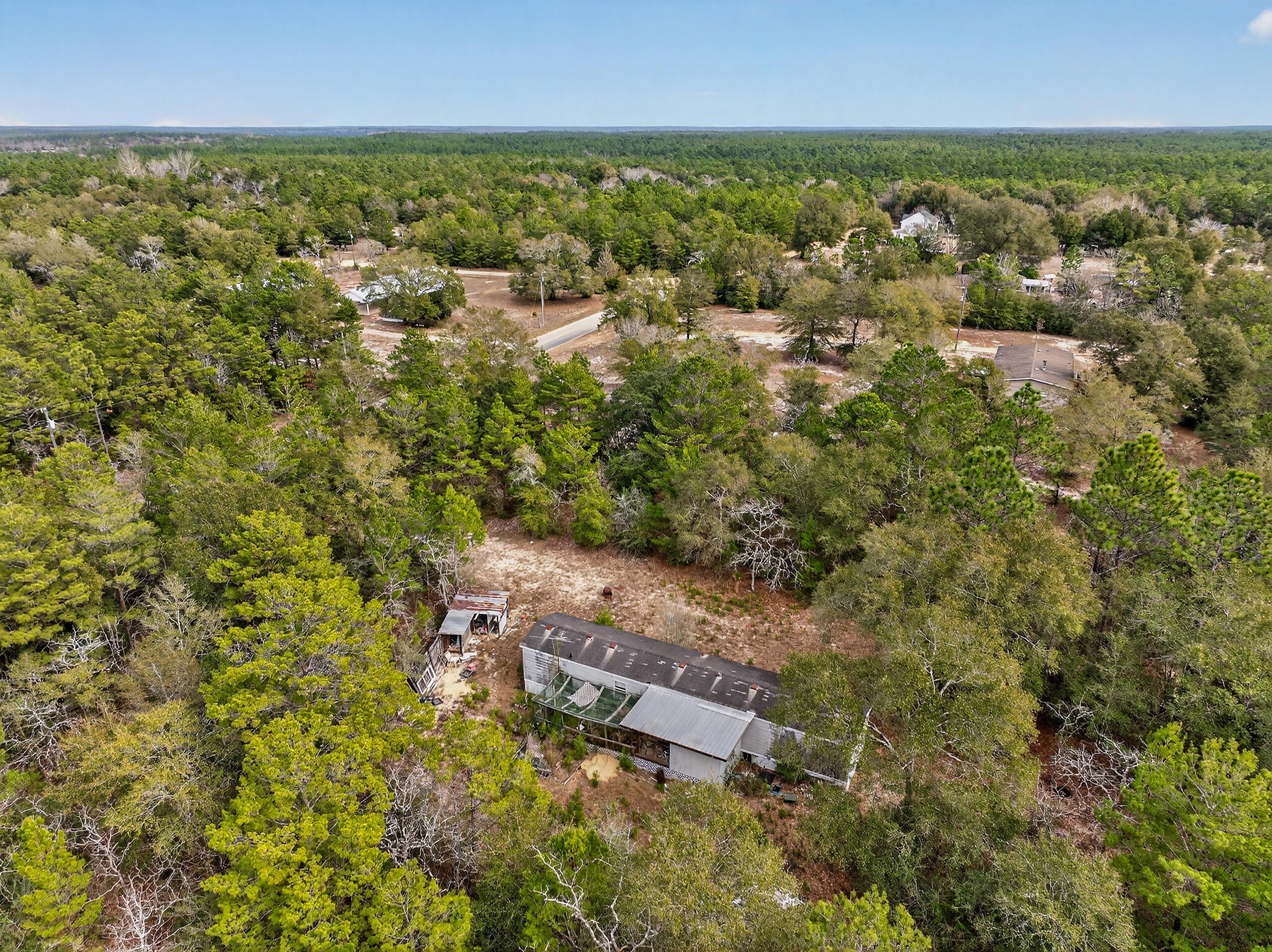 610 Spring Hill Road DeFuniak Springs, FL 32433 - Photo 9 of 20 an aerial view of residential house with outdoor space