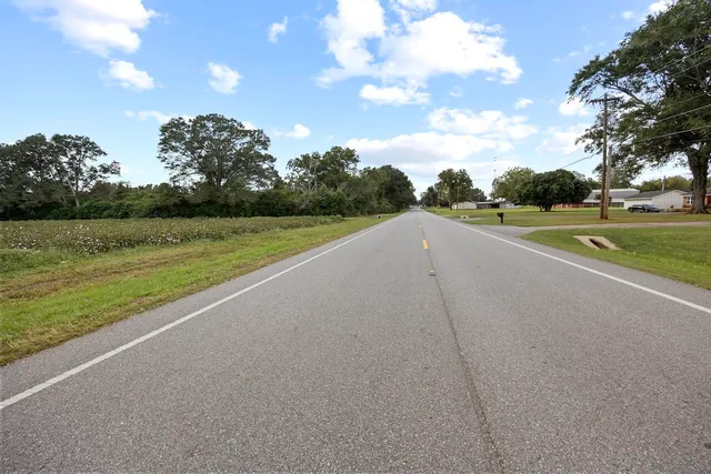 a view of a golf course with a lake