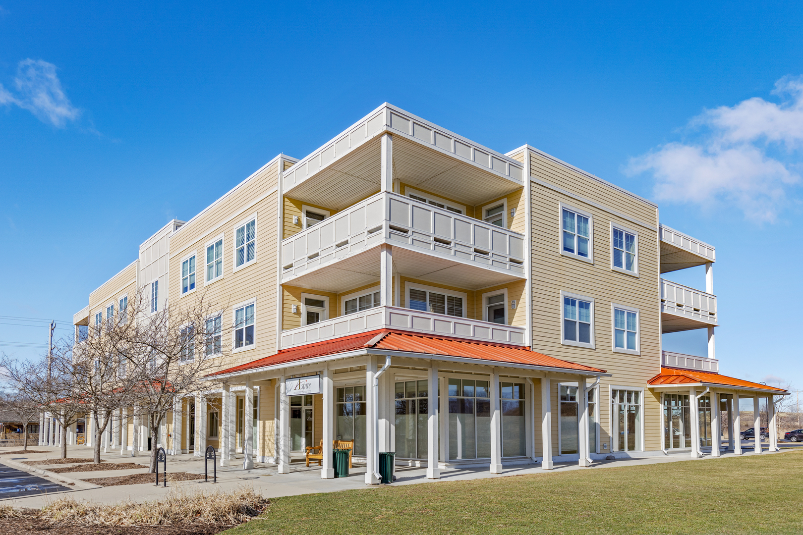 970 Harris Road, Unit 23 Grayslake, IL 60030 - Photo 29 of 29 a view of a building next to a yard