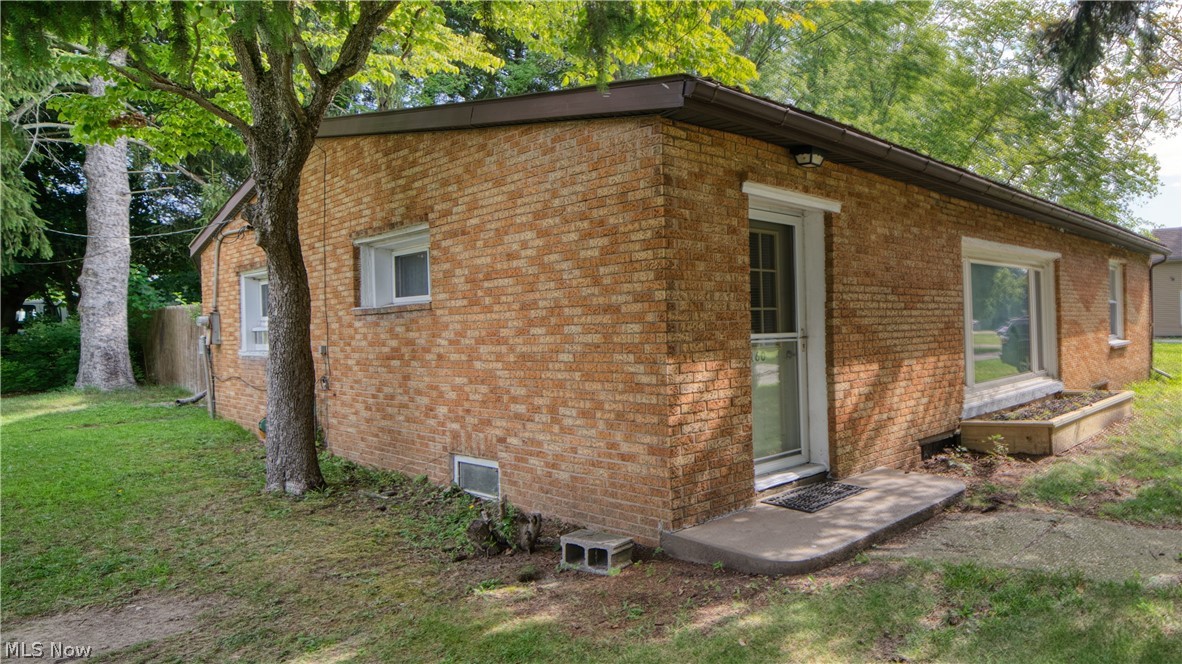160 Welton Road Conneaut, OH 44030 - Photo 16 of 16 View of property exterior with a yard