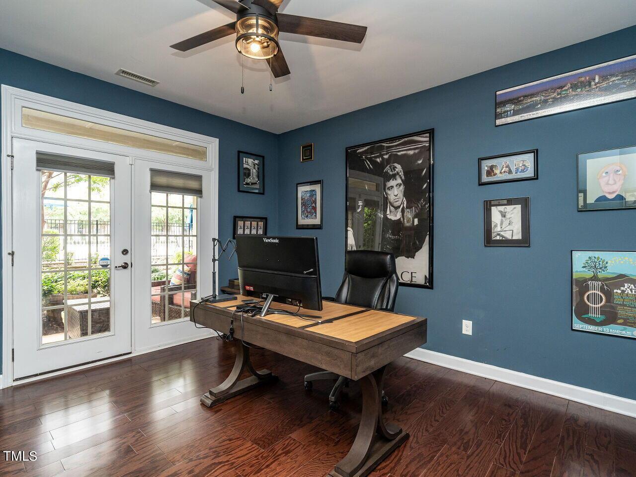 1316 Cornell Place Raleigh, NC 27607 - Photo 24 of 31 a view of a workspace with furniture and a window