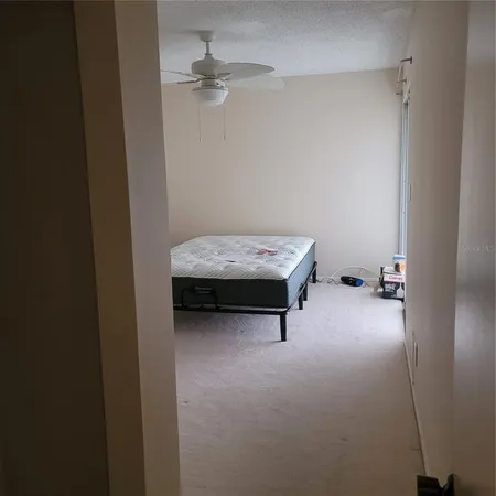 a view of empty room with windows