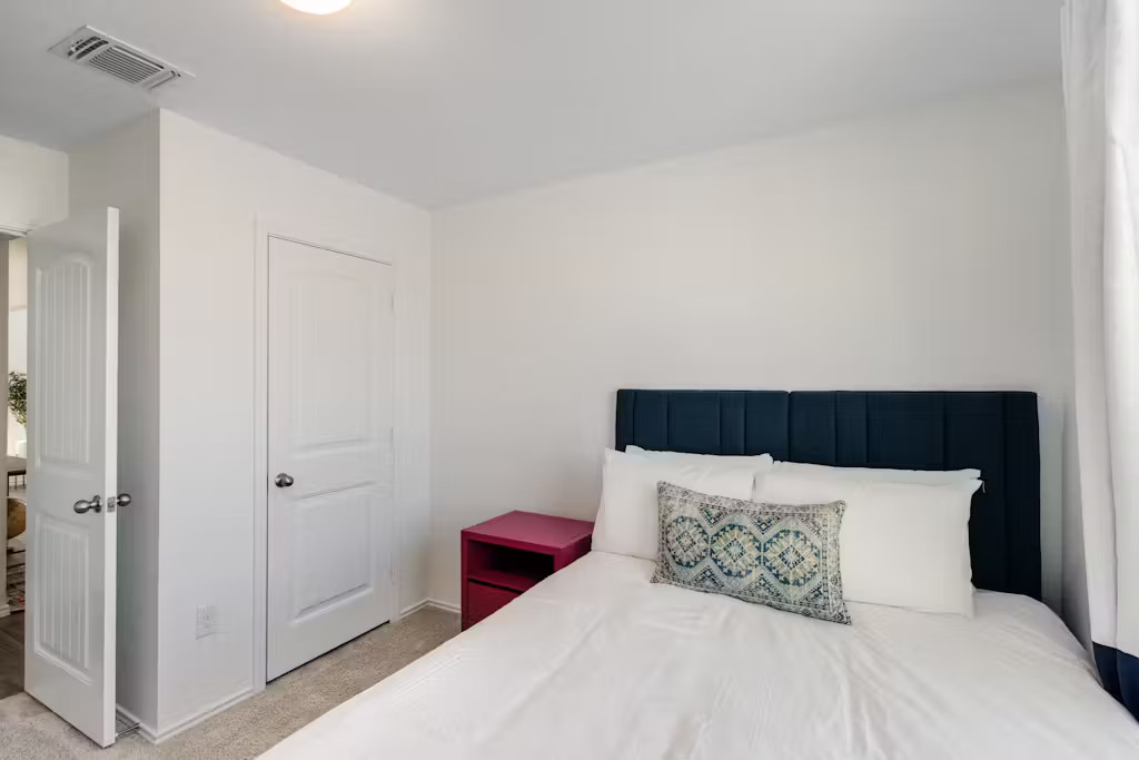 3609 Batson Drive Austin, TX 78725 - Photo 10 of 33 Bedroom featuring light colored carpet