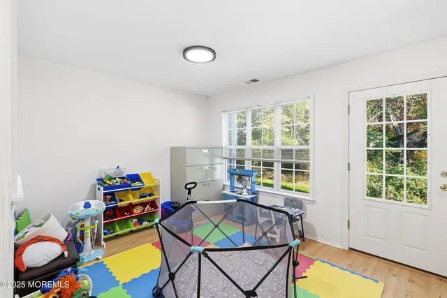 a workspace with furniture and a window