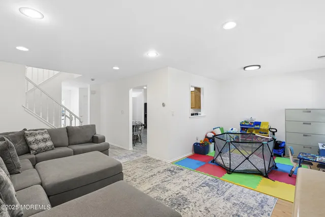 a living room with furniture and a couch