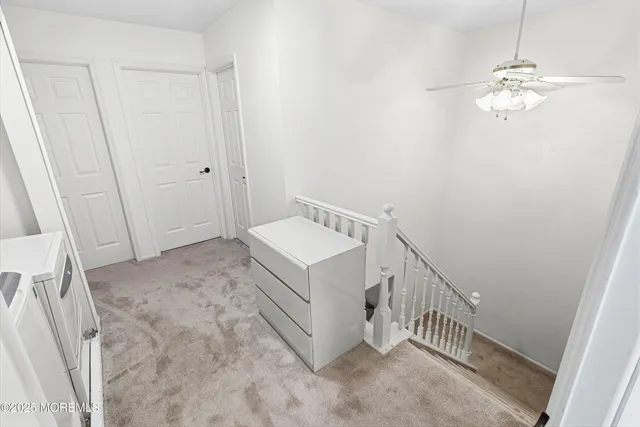 a view of a hallway with entryway