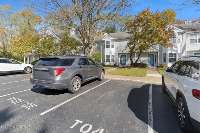 a car parked in front of a house