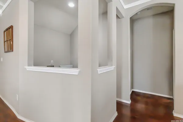 a view of small space with wooden floor