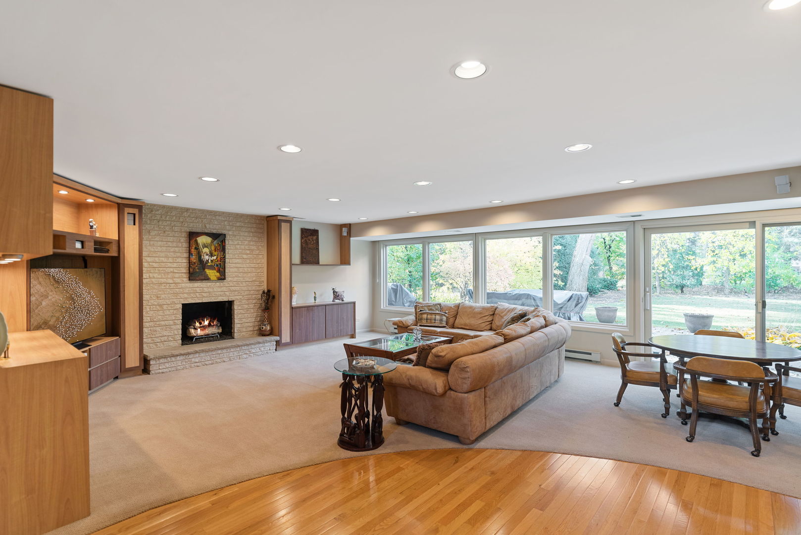 1736 Cavell Avenue Highland Park, IL 60035 - Photo 20 of 29 a living room with fireplace furniture and floor to ceiling window