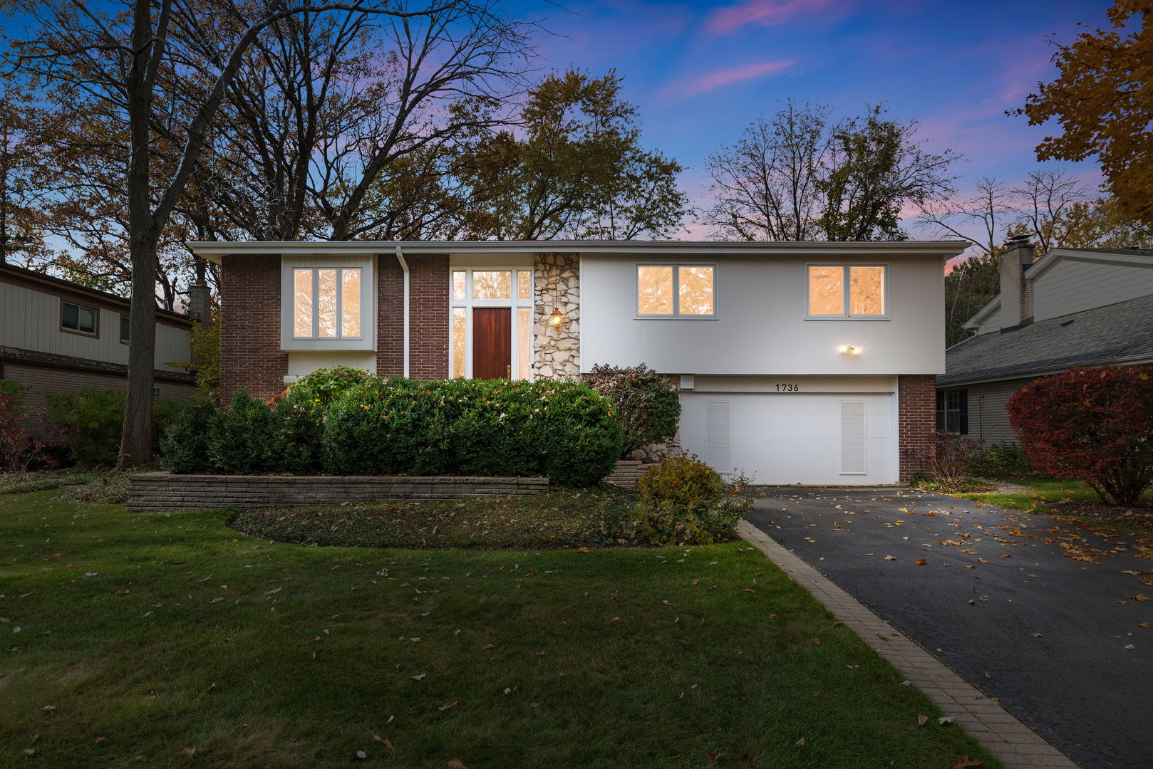 1736 Cavell Avenue Highland Park, IL 60035 - Photo 2 of 29 a front view of a house with a yard