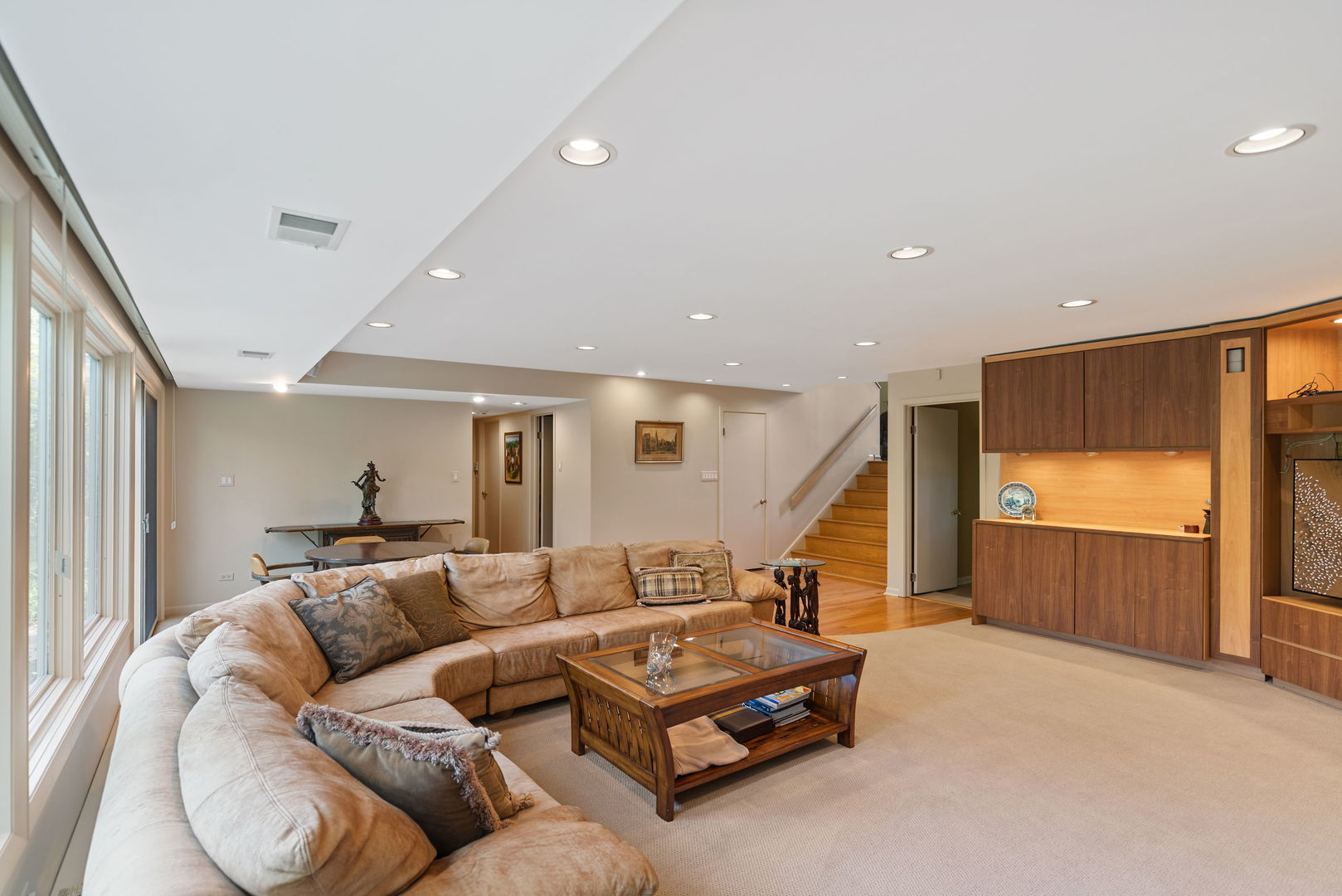 1736 Cavell Avenue Highland Park, IL 60035 - Photo 21 of 29 a living room with furniture and a flat screen tv