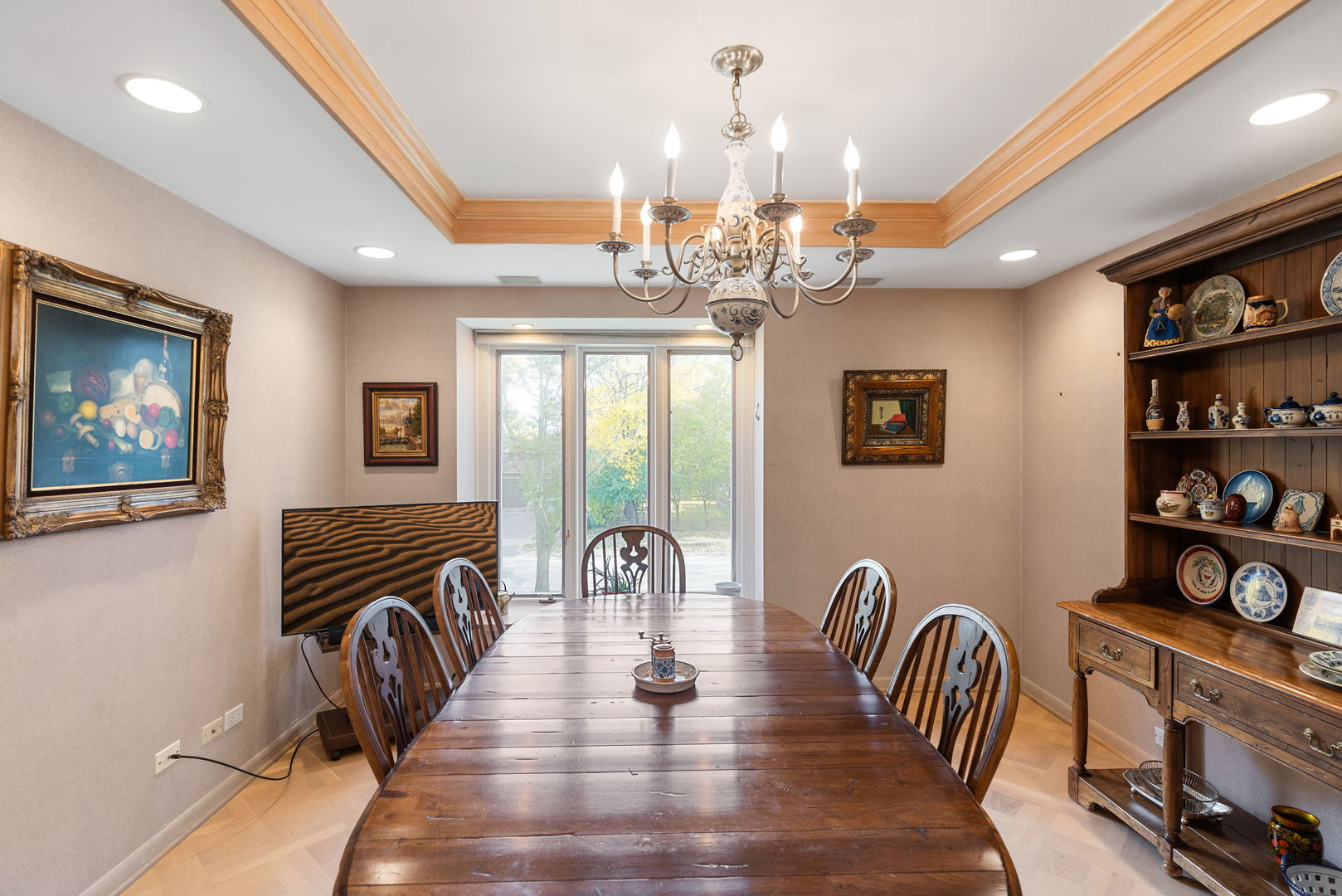 1736 Cavell Avenue Highland Park, IL 60035 - Photo 9 of 29 a view of a dining room with furniture a chandelier and wooden floor